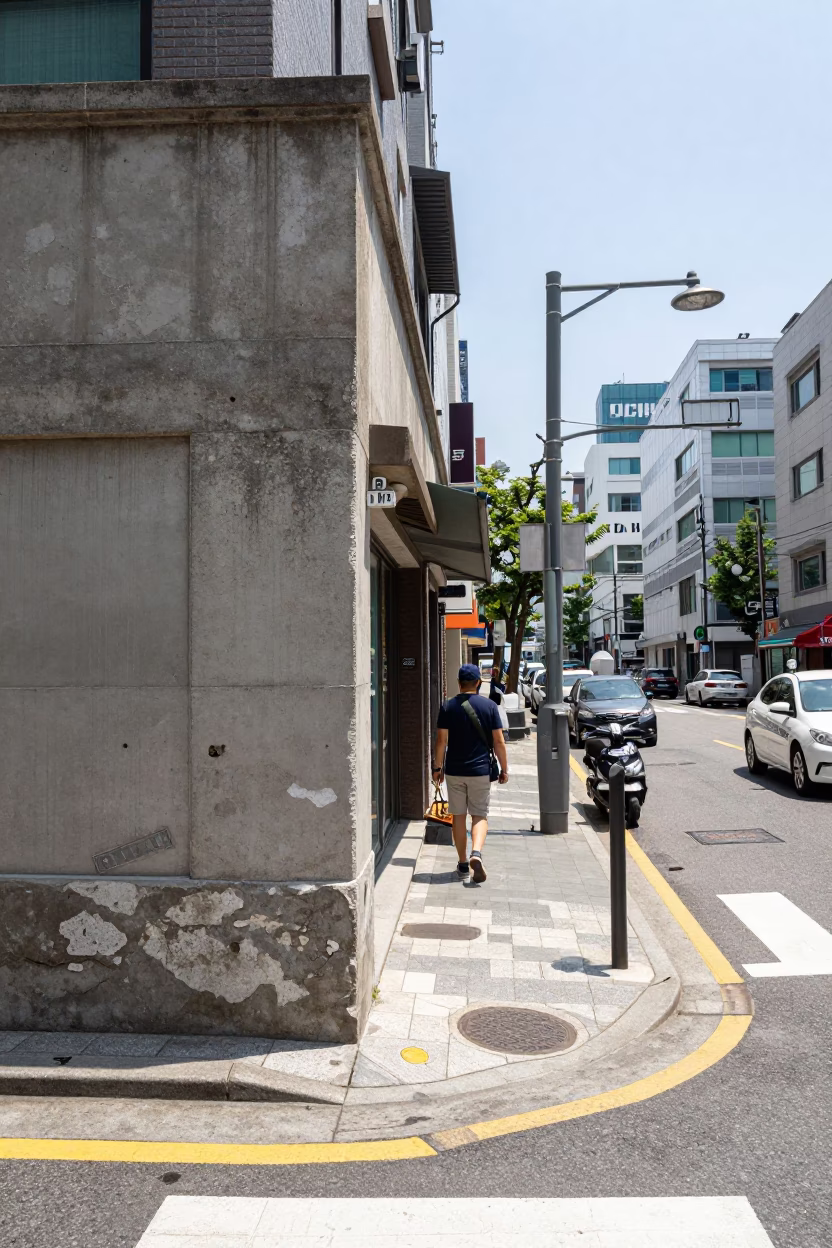 Seoul Street Scene Under Flat Noon Glare with Concrete Walls and Pedestrians in in Seoul, South Korea