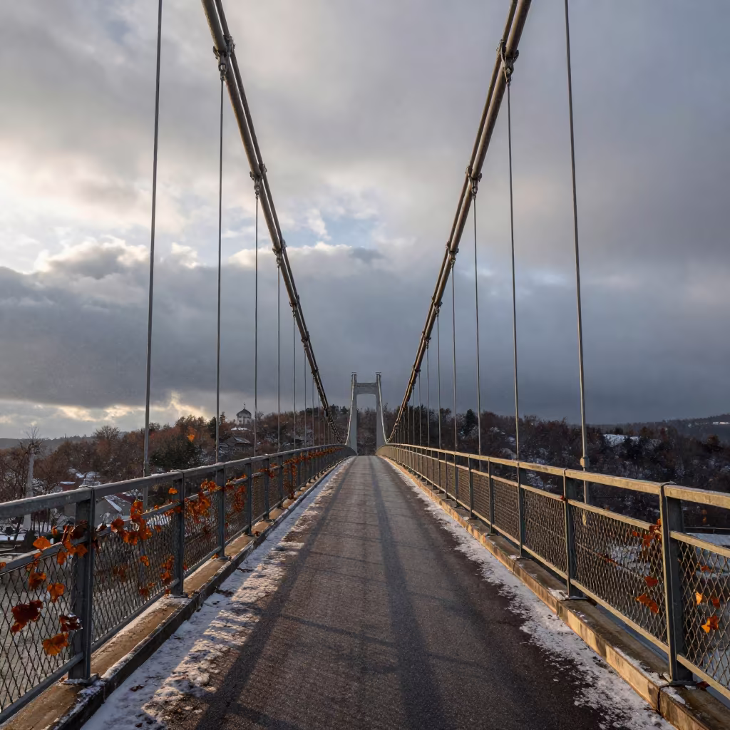 Serbian Suspension Bridge Morning Fog Storms in over a horizon of stacked thunderheads in Serbia