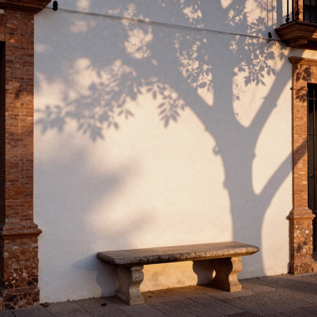 Seville Spain Copper Dusk Leaf Shadows Plaster Wall Stone Bench Candid Street Moment in in Seville, Spain