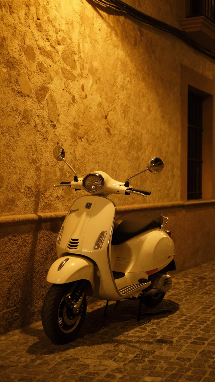 Seville Vespa Parked at Deep In The Night Light in in Seville, Spain