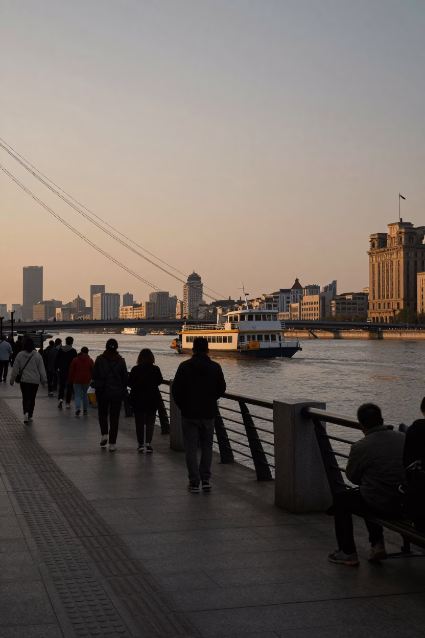 Shanghai Bund Evening Street Scene with Chain Ferry and Geraniums in in Shanghai, China