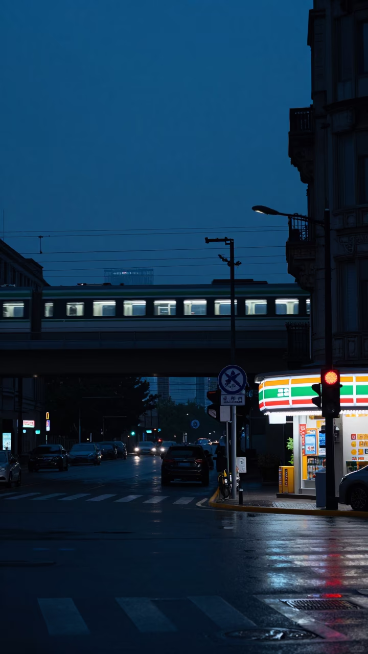 Shanghai China predawn street scene with commuter train crossing bridge in darkness in in Shanghai, China
