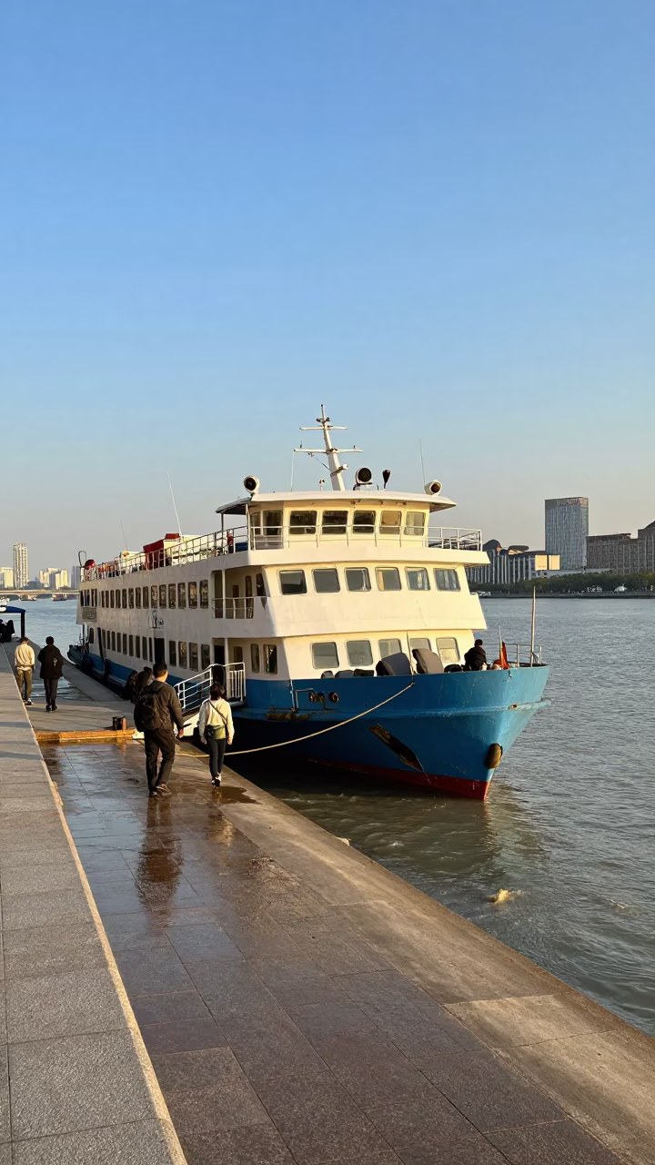 Shanghai Ferry Docking at Late Afternoon with Passengers and Bicycles Loading in in Shanghai, China