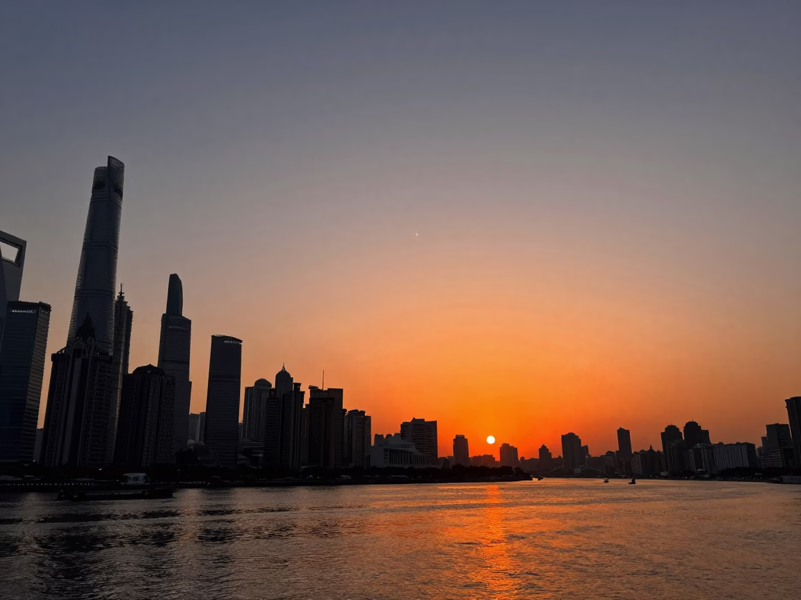 Shanghai Skyline at Sunset with Rising Sky Lanterns from the Bund in in Shanghai, China