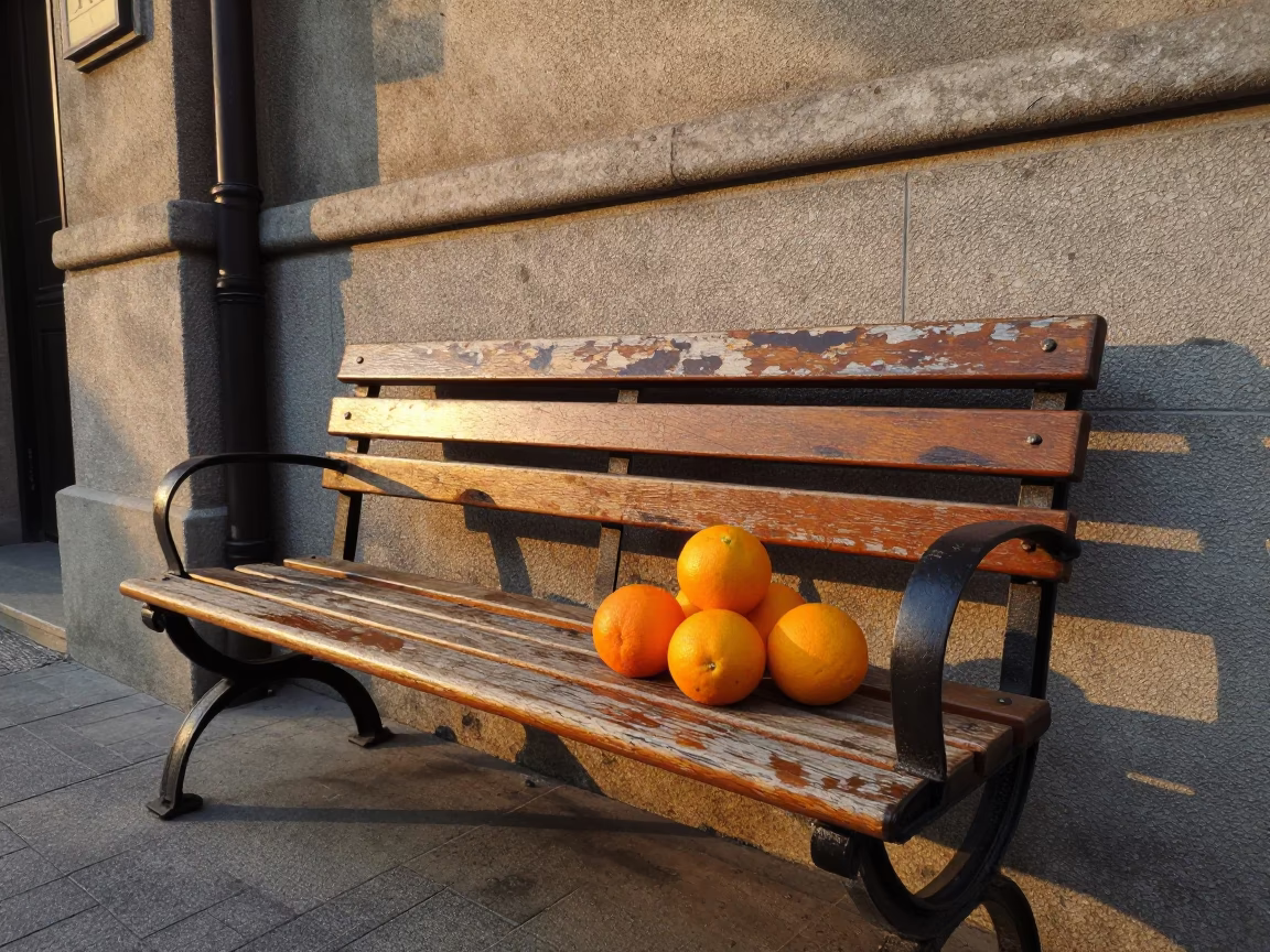 Shanghai street corner at sunset with oranges and weathered bench slats in in Shanghai, China