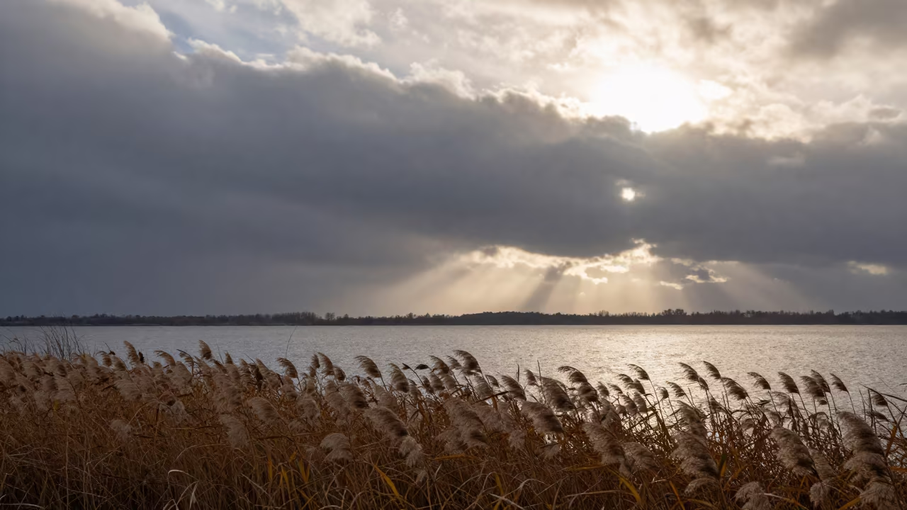 Shelf Cloud Racing Lake Sunset Snow in across a storm-bright plain near Vaughan