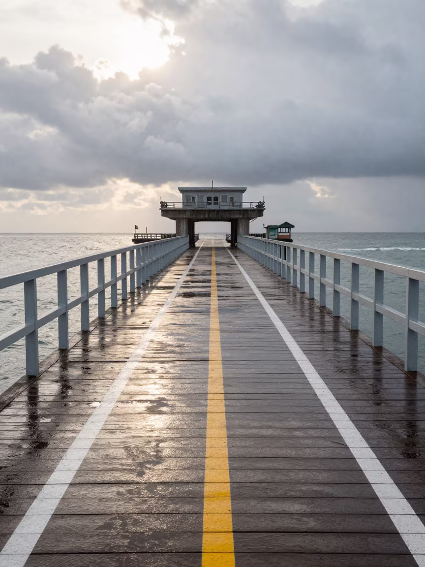 Shining Drawbridge Deck Markings in Monsoon Drizzle in beside a bridge pier above moving water in Philippines