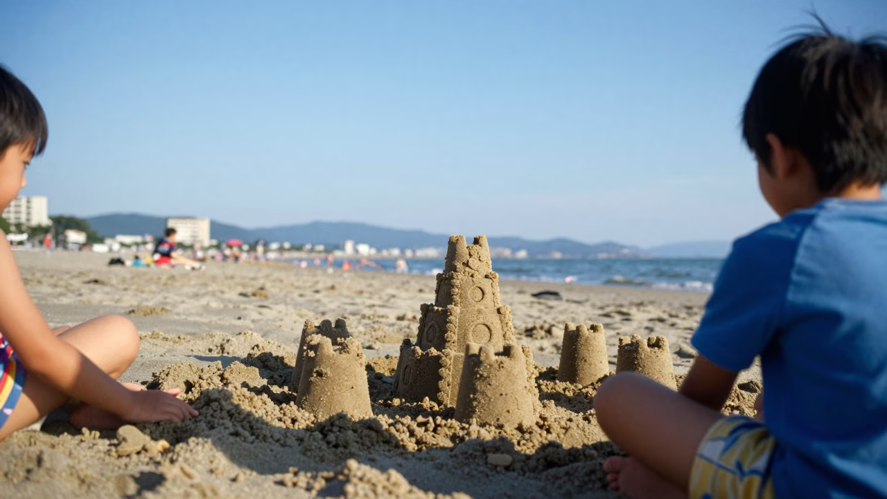 Siblings Building Sandcastle in Fukuoka in in Fukuoka