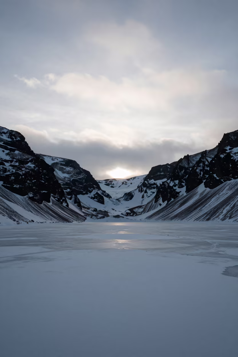 Silhouette of Frozen Tarn in Winter Quebec Valley in across a wide valley floor in Quebec
