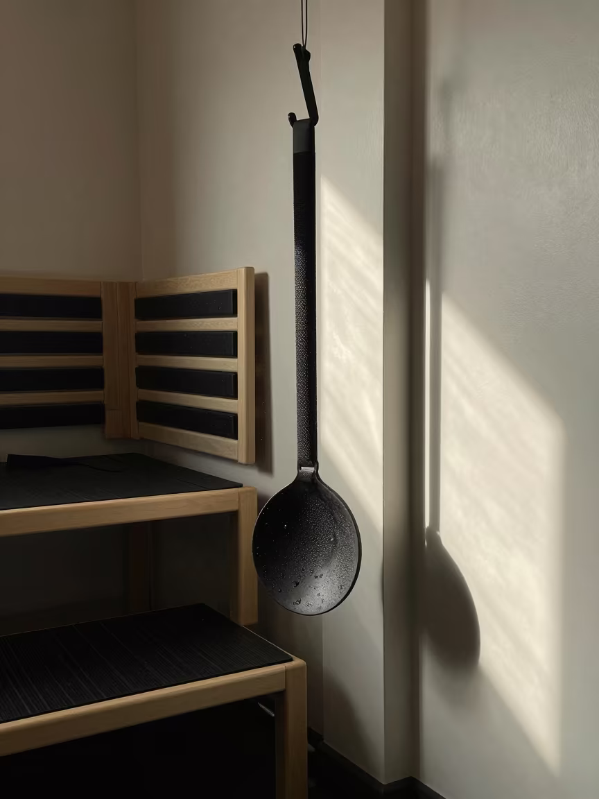 Silhouette Sauna Ladle Rail in Gym Recovery Area in at a gym check-in desk near Bursa