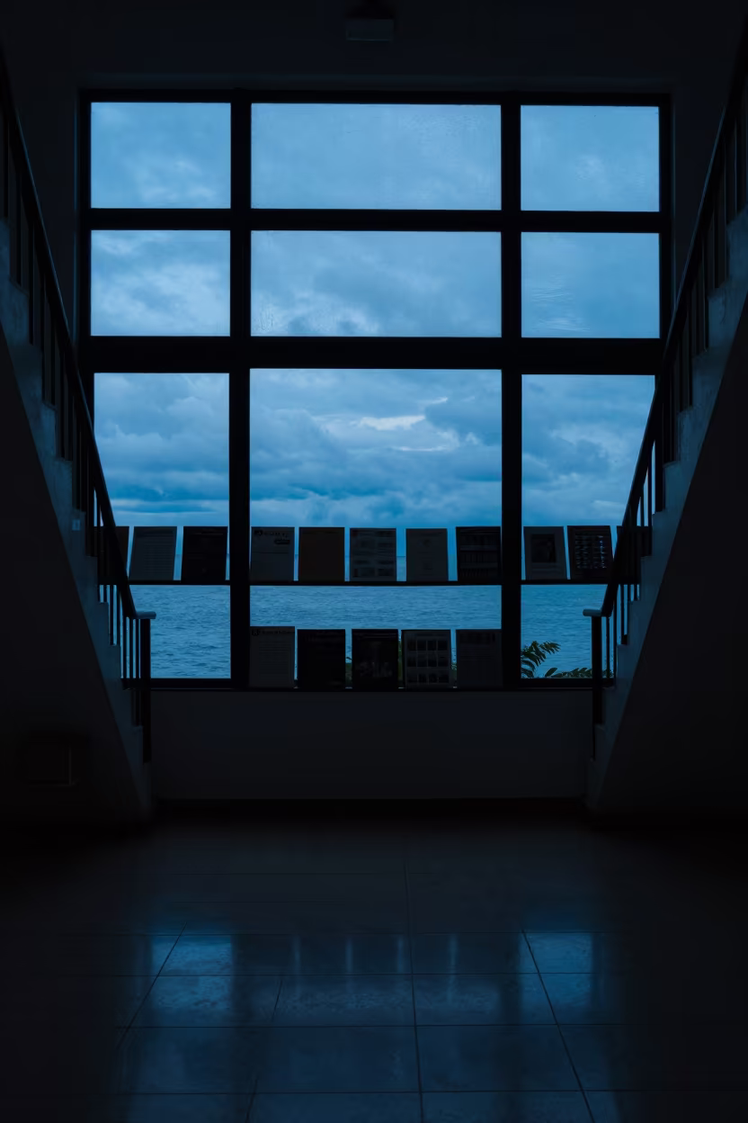 Silhouetted Annual Report Shelf in Krabi Stair Hall in inside a tiled stair hall near Krabi