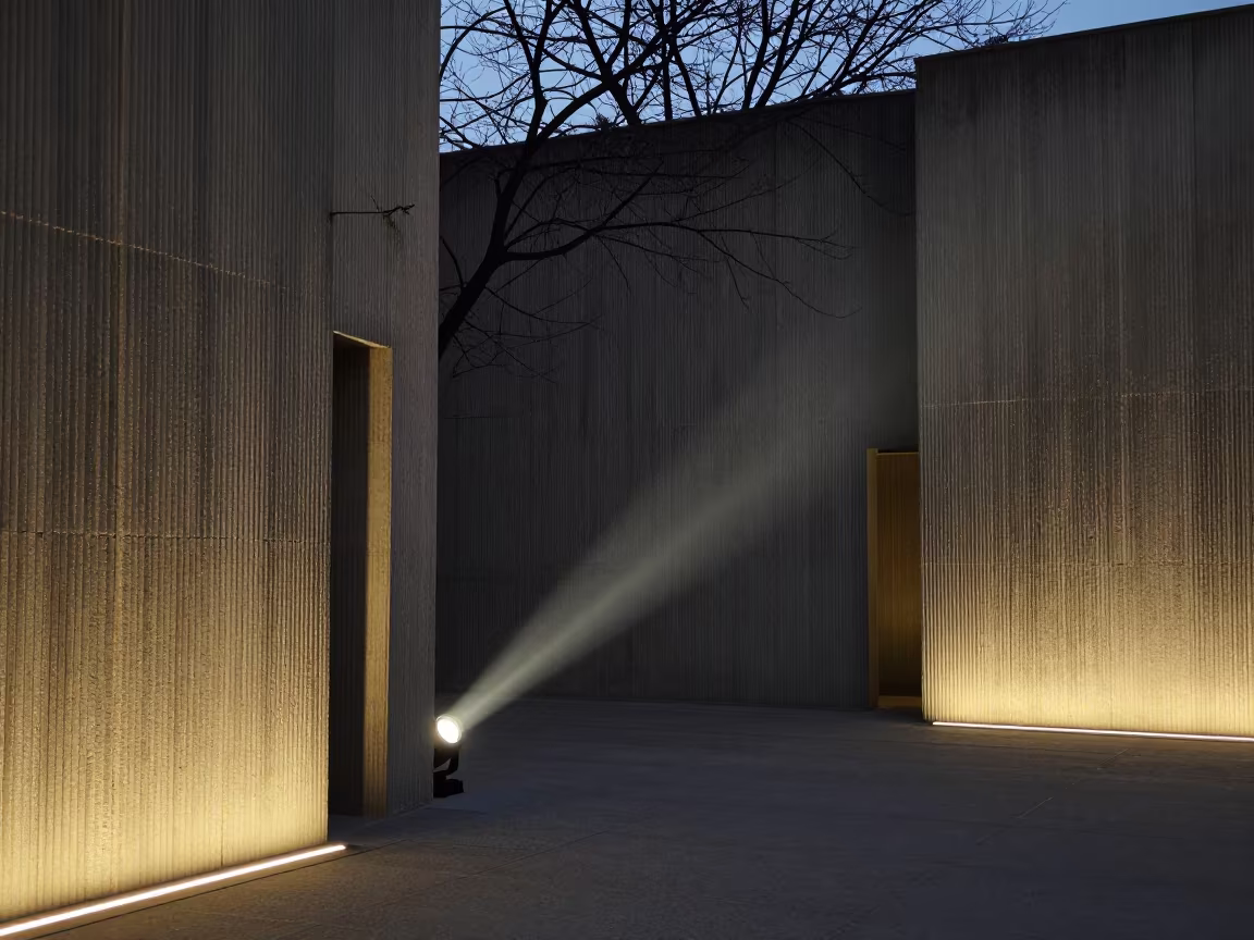 Silhouetted Branches in Predawn Concrete Lobby in inside a ribbed concrete lobby near Gondia