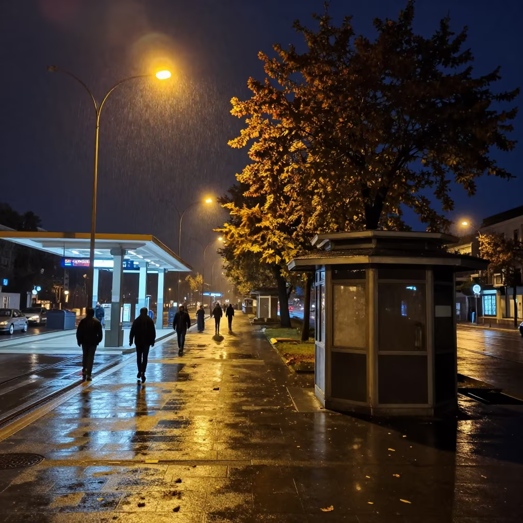 Silhouetted Commuters Rainy Night Yozgat in by a rain-darkened kiosk in Yozgat