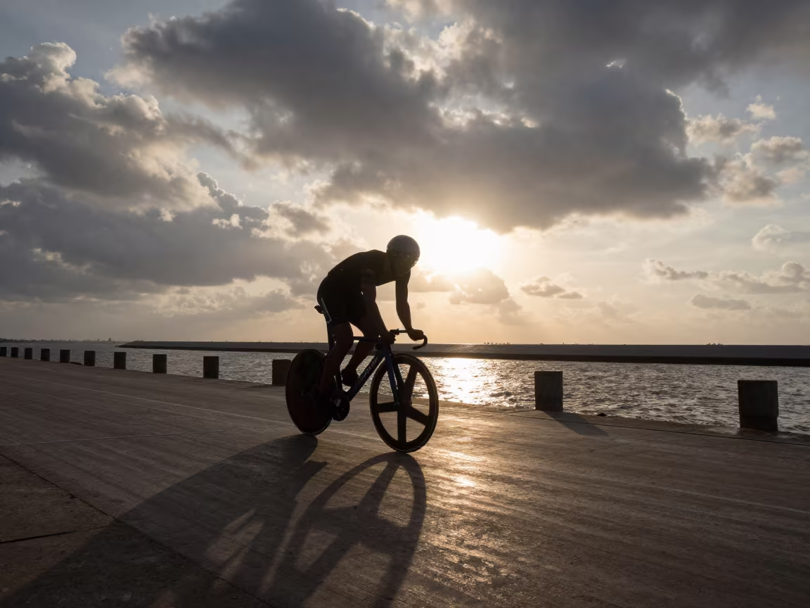 Silhouetted Cyclist Sprints Accra Harbor Quay in at a harbor quay near Accra