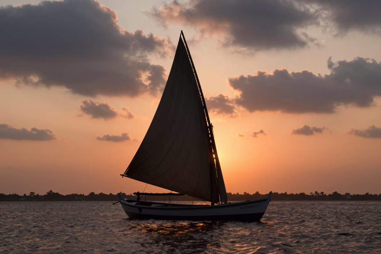 Silhouetted Dhow Sail at Sunset in Madhya Pradesh in in Madhya Pradesh