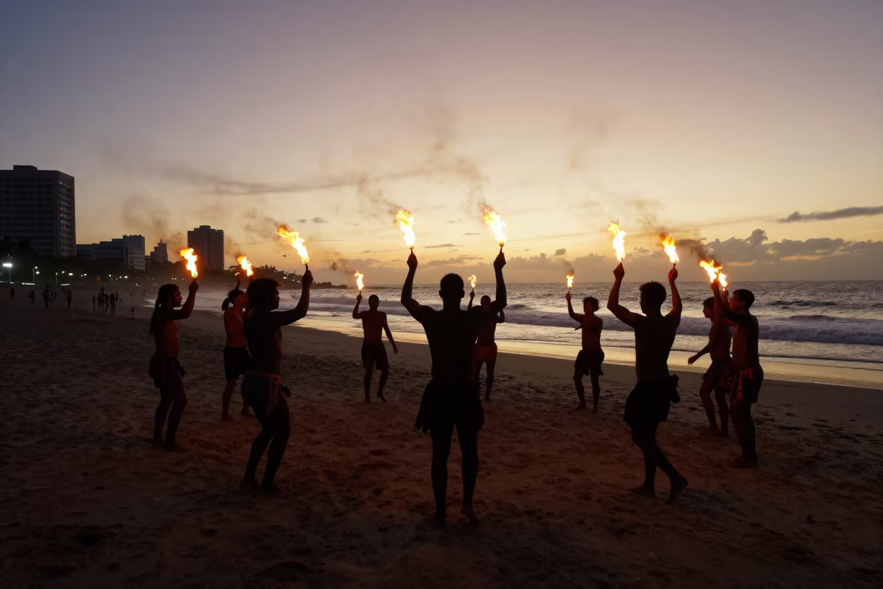 Silhouetted Fire Dancers on Salvador Beach at Dusk in at a jazz club in Salvador