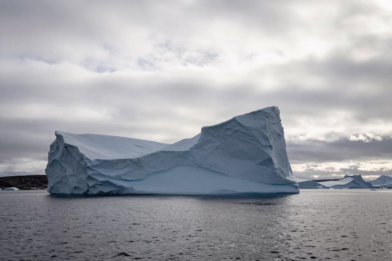 Silhouetted Iceberg Arch in Arctic Summer Light in near Tromsø