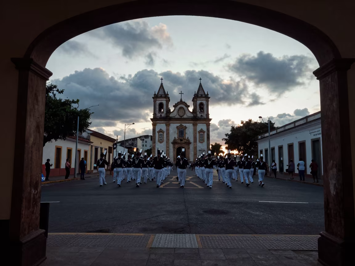 Silhouetted Marching Band Corner Turn in Sao Luis in at a festival street procession near Sao Luis