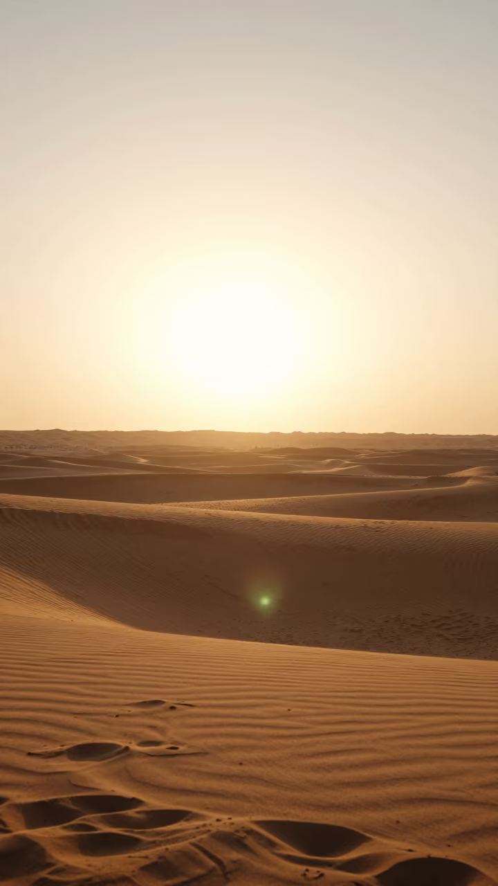 Silhouetted Mesa Against Golden Desert Sky in near Dubai