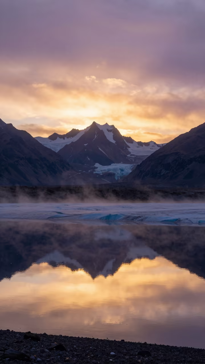 Silhouetted Mountain Reflections at Sunset in along a wave-cut shoreline near Vizianagaram