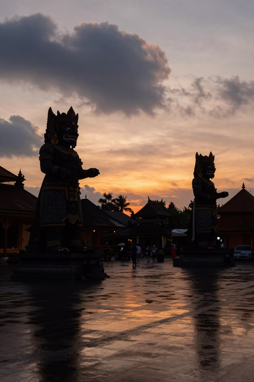 Silhouetted Ogoh Ogoh Figures Sunset Temple in in a temple courtyard in Yogyakarta