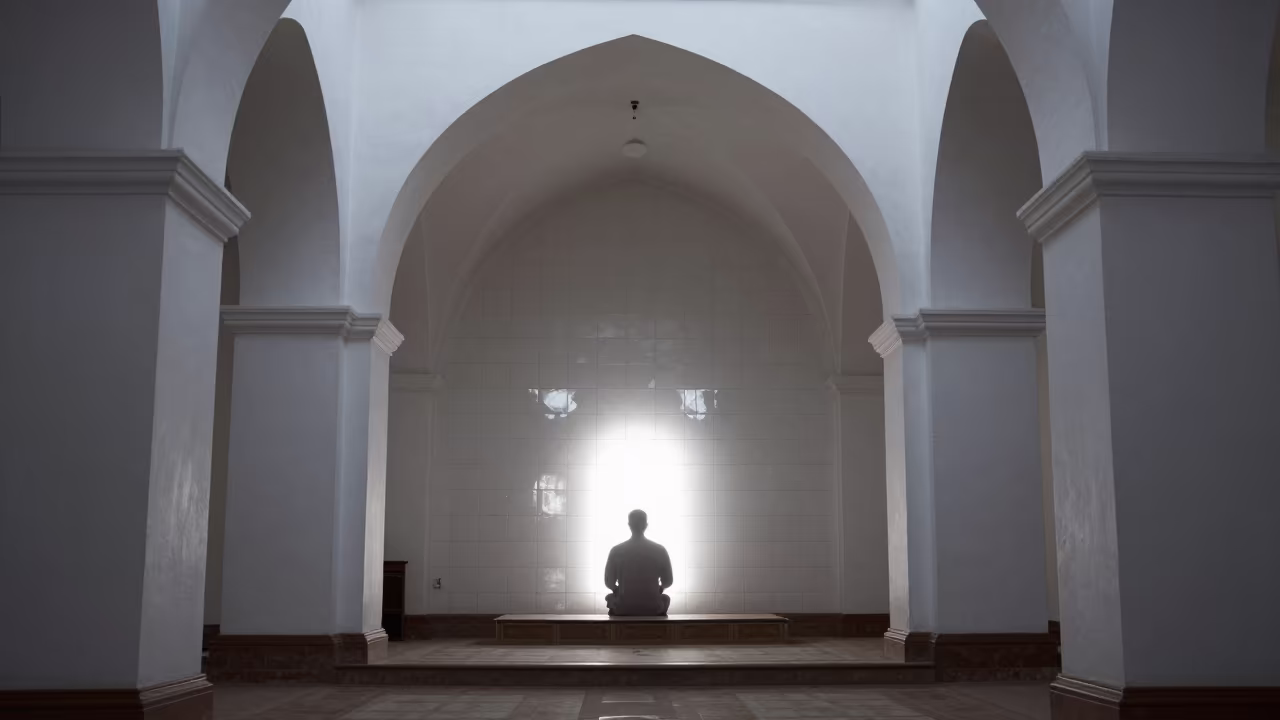Silhouetted Prayer House Interior with Geometric Tiles in beside a prayer wheel corridor in Cochabamba