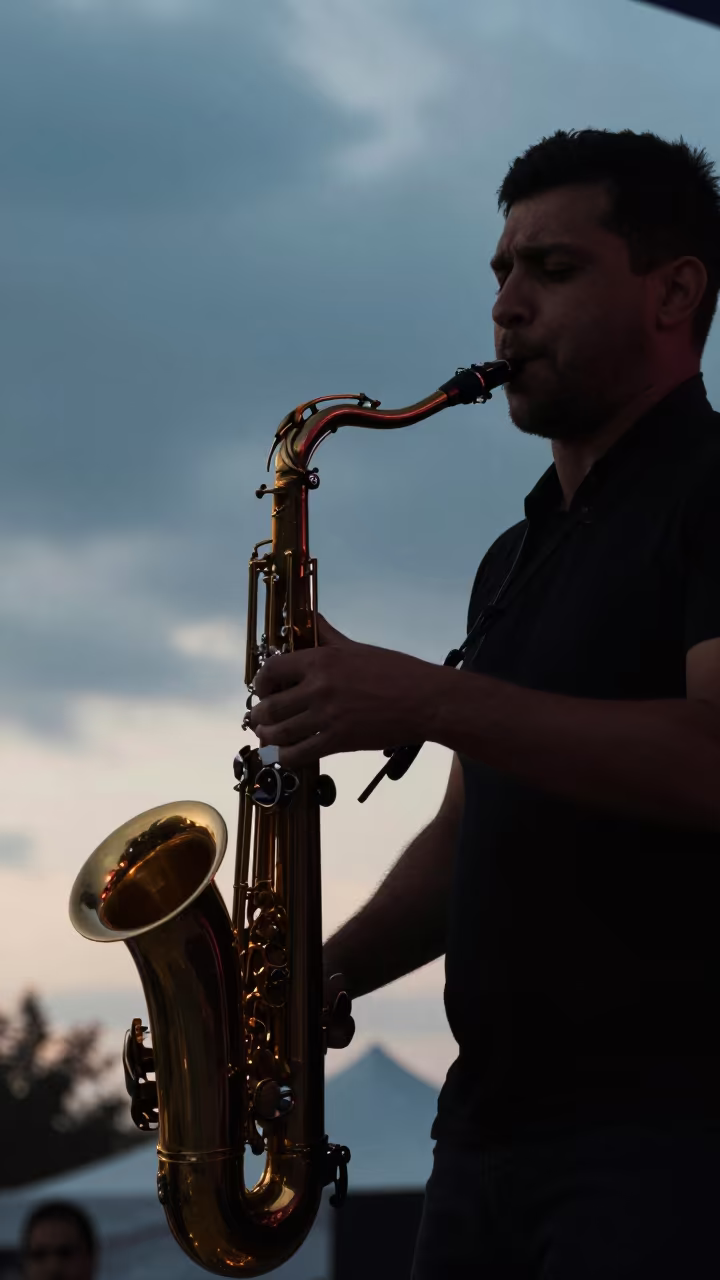 Silhouetted Saxophonist Uşak Festival Blue Hour in on a festival main stage in Uşak