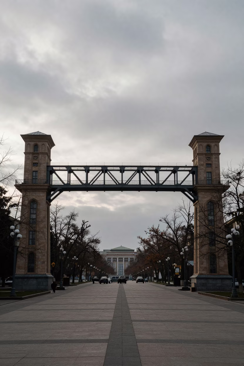 Silhouetted Skyway Bridge Over Dushanbe Plaza at Sunset in across a formal civic plaza in Dushanbe