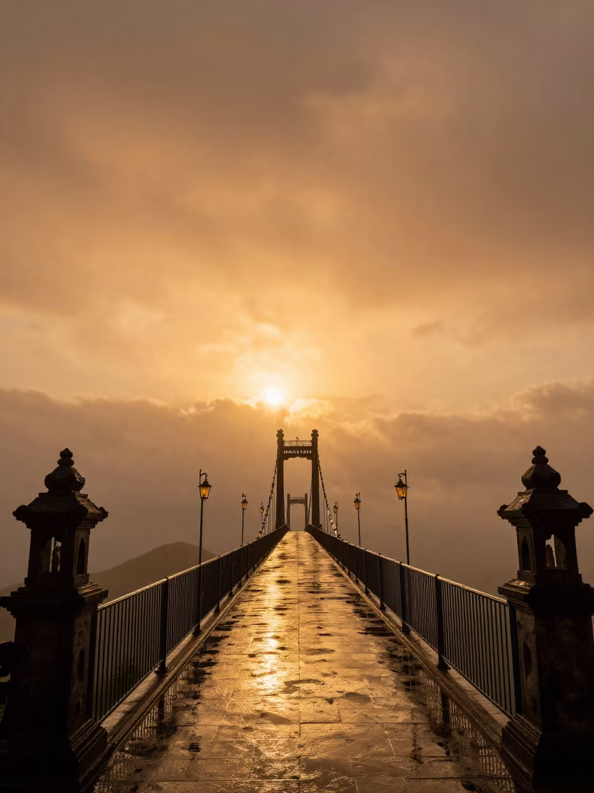 Silhouetted Suspension Bridge in Galle Temple Clouds in in a lantern-lined temple precinct in Galle