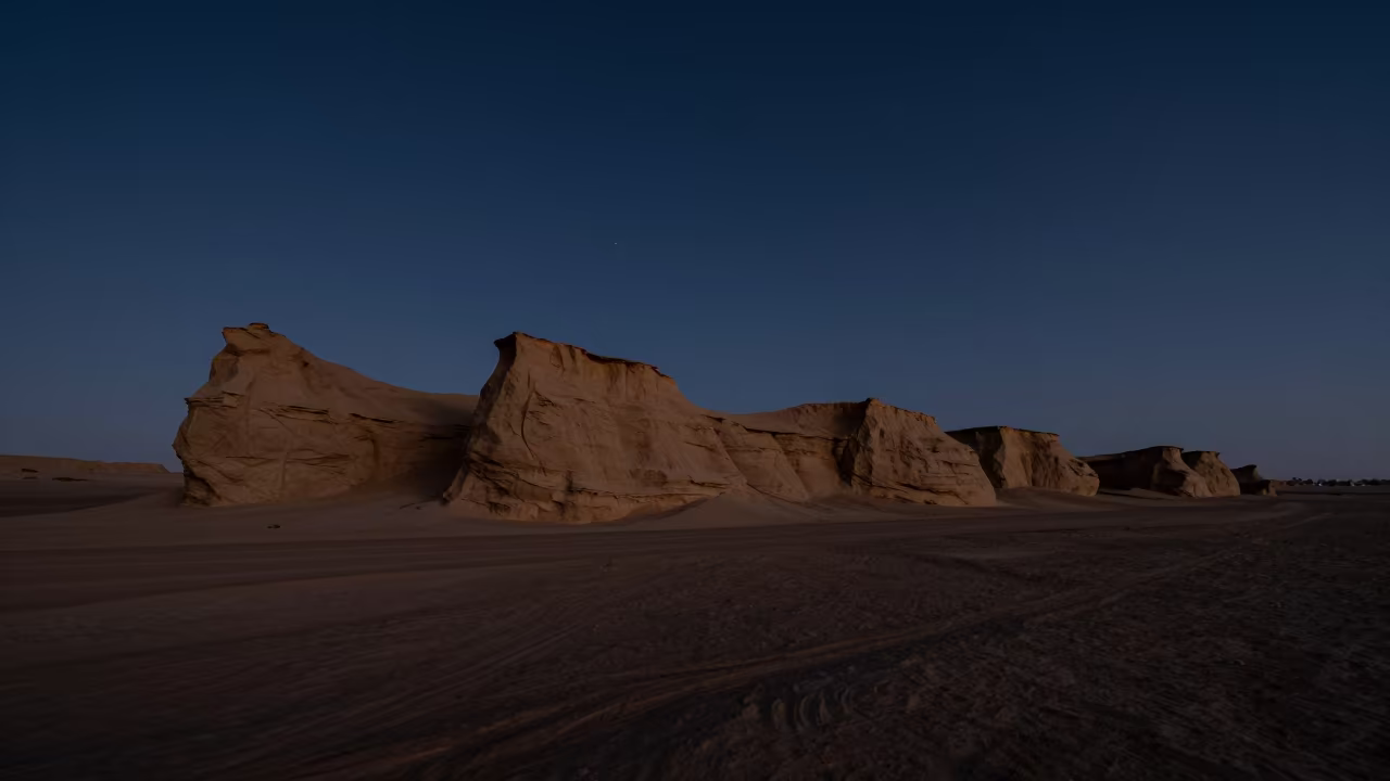 Silhouetted Yardang Under Midnight Starlight in near Riyadh