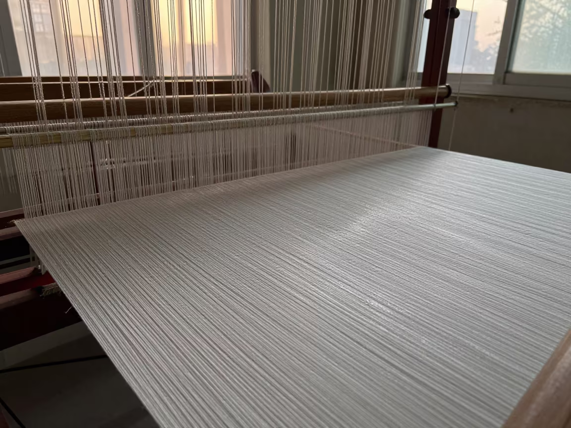 Silk Thread Loom Macro Karol Bagh Winter in against woven linen fibers in Karol Bagh, Delhi