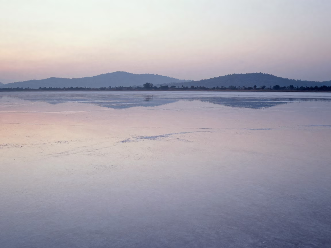 Silver Dawn Over Salt Flats Near Mumbai Foothills in from a ridge above layered foothills near Bandra, Mumbai