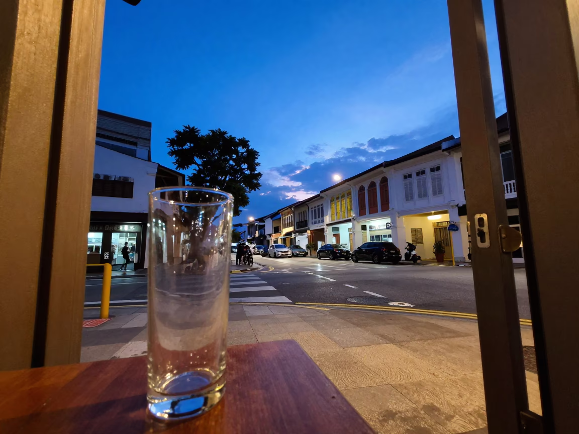 Singapore Blue Hour Street Scene with Glass Carafe and Doorframe Details in in Singapore, Singapore