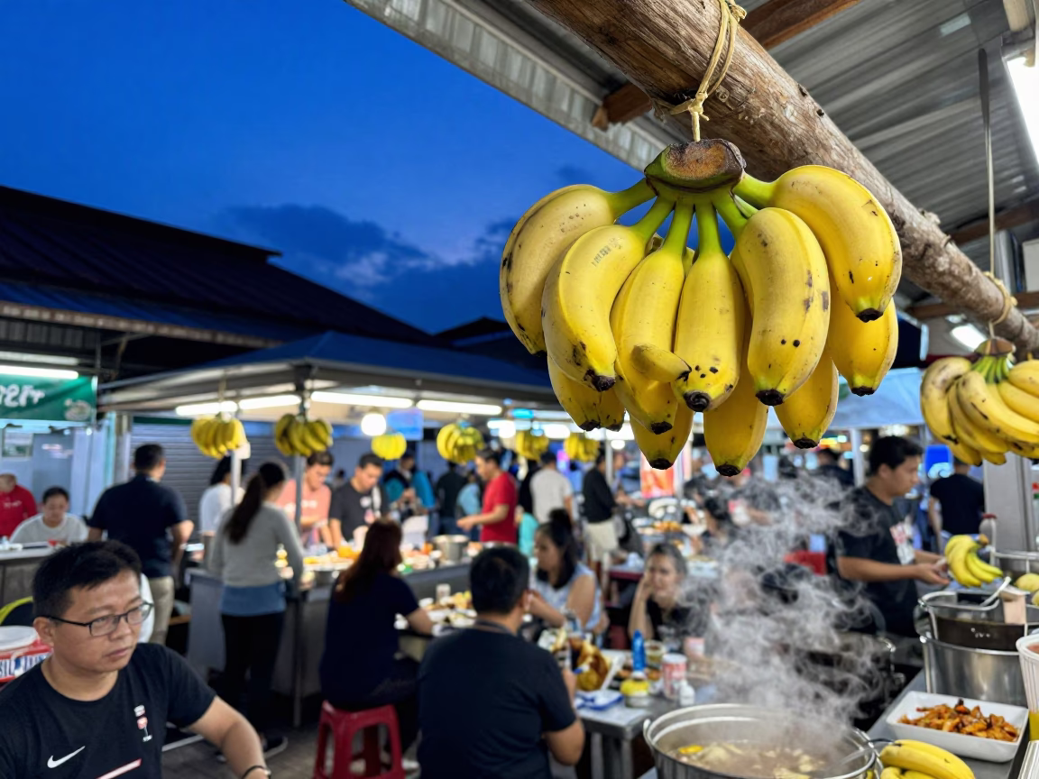 Singapore Hawker Centre Evening Dusk Bananas Hanging Over Steamy Food Stall Crowd in in Singapore, Singapore