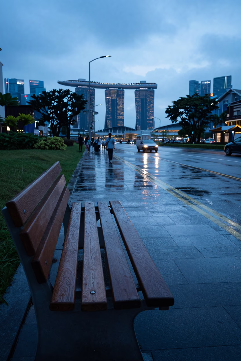 Singapore Pre-Dawn Street Scene with Wet Bench Slats and Gardenia Bush in in Singapore, Singapore