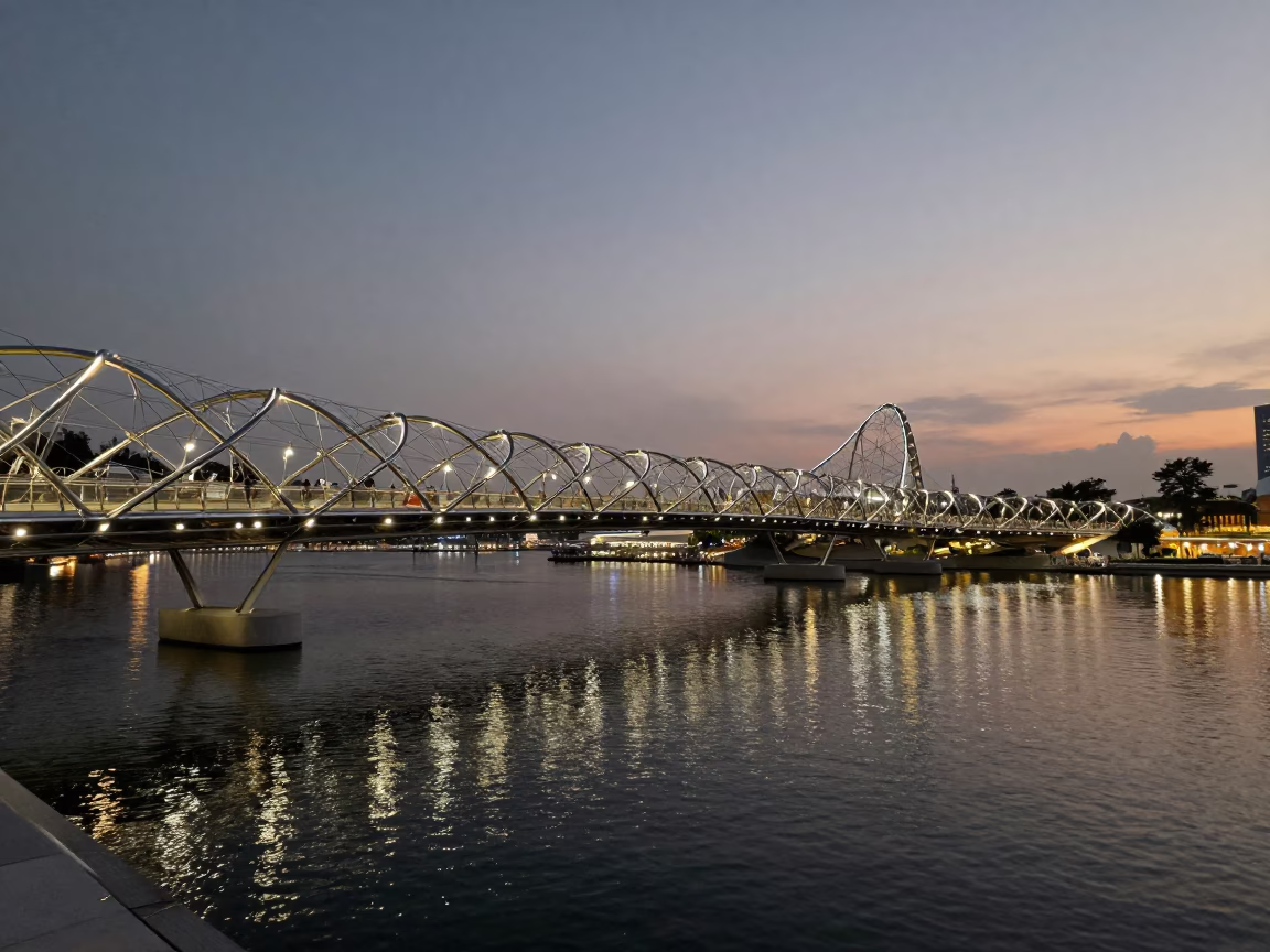 Singapore Twilight View of Helix Bridge Illumination Against Marina Bay Waterfront and Urban Skyline in in Singapore, Singapore