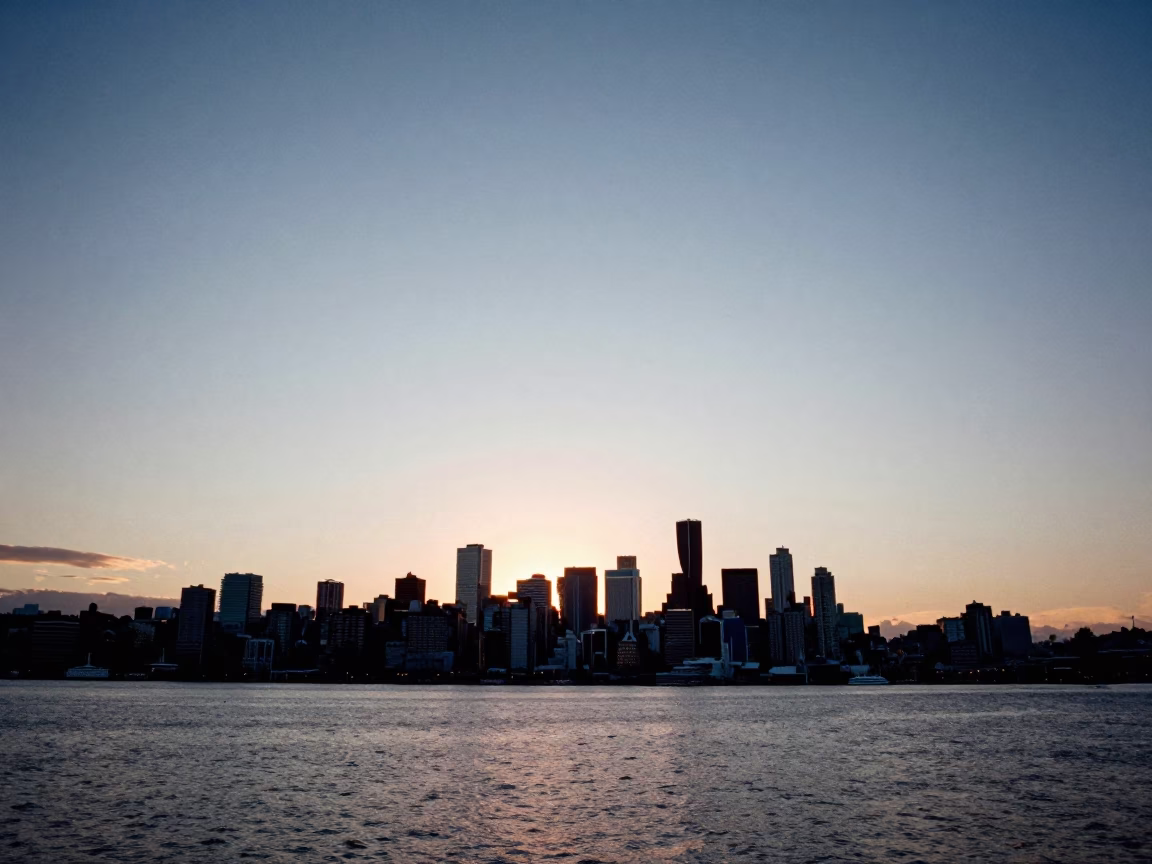 Skyline in Seattle at As The Sun Drops Toward The Horizon in in Seattle, Washington, United States