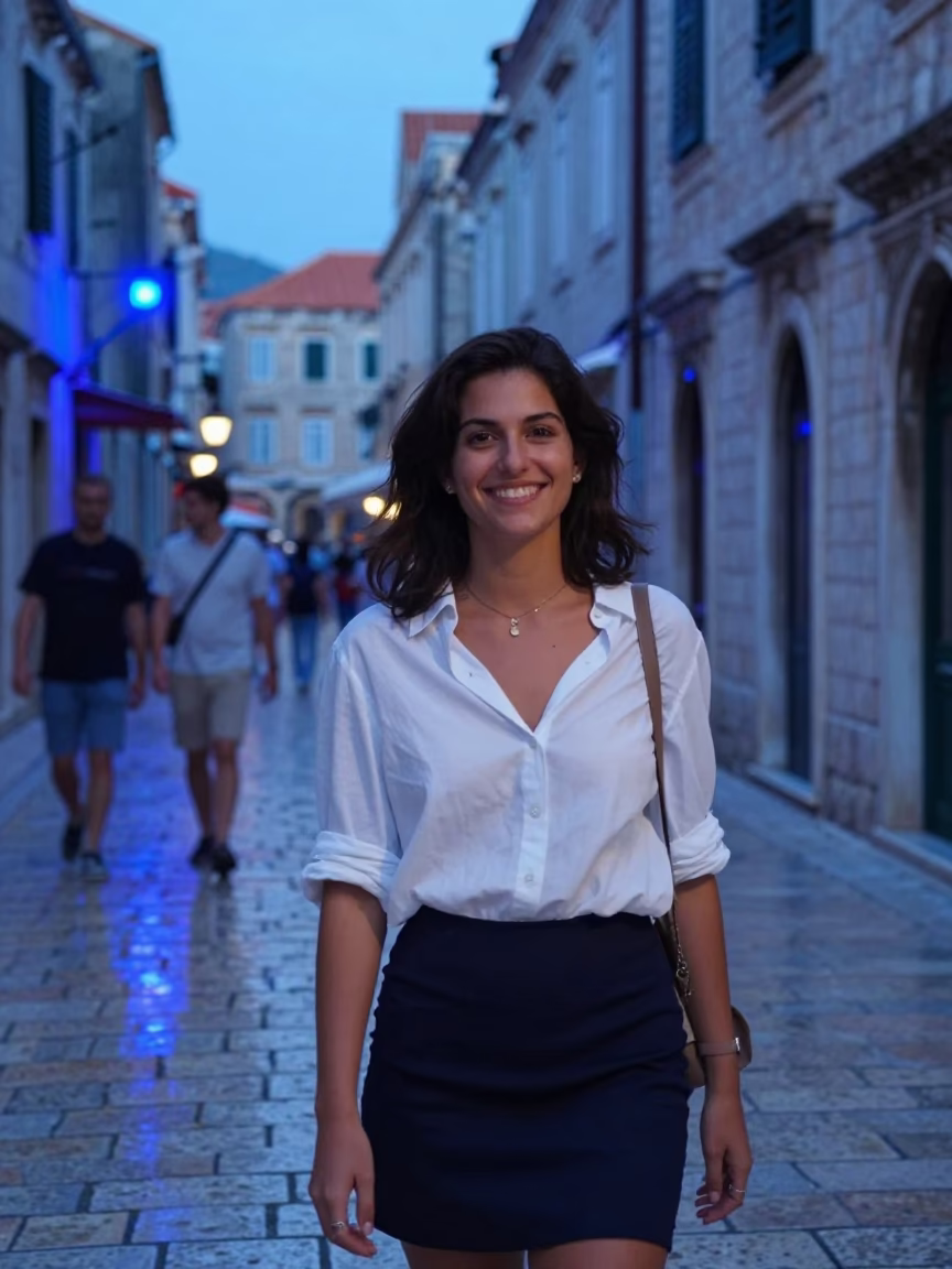 Smiling Woman in Dubrovnik at The Last Blue Light Of Evening in in Dubrovnik, Croatia