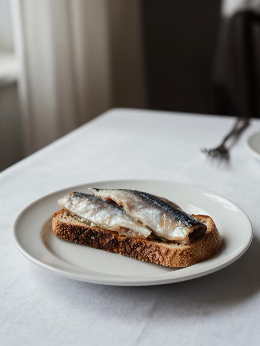 Smørrebrød with Pickled Herring on Linen in on a linen-covered restaurant table in Sunderland