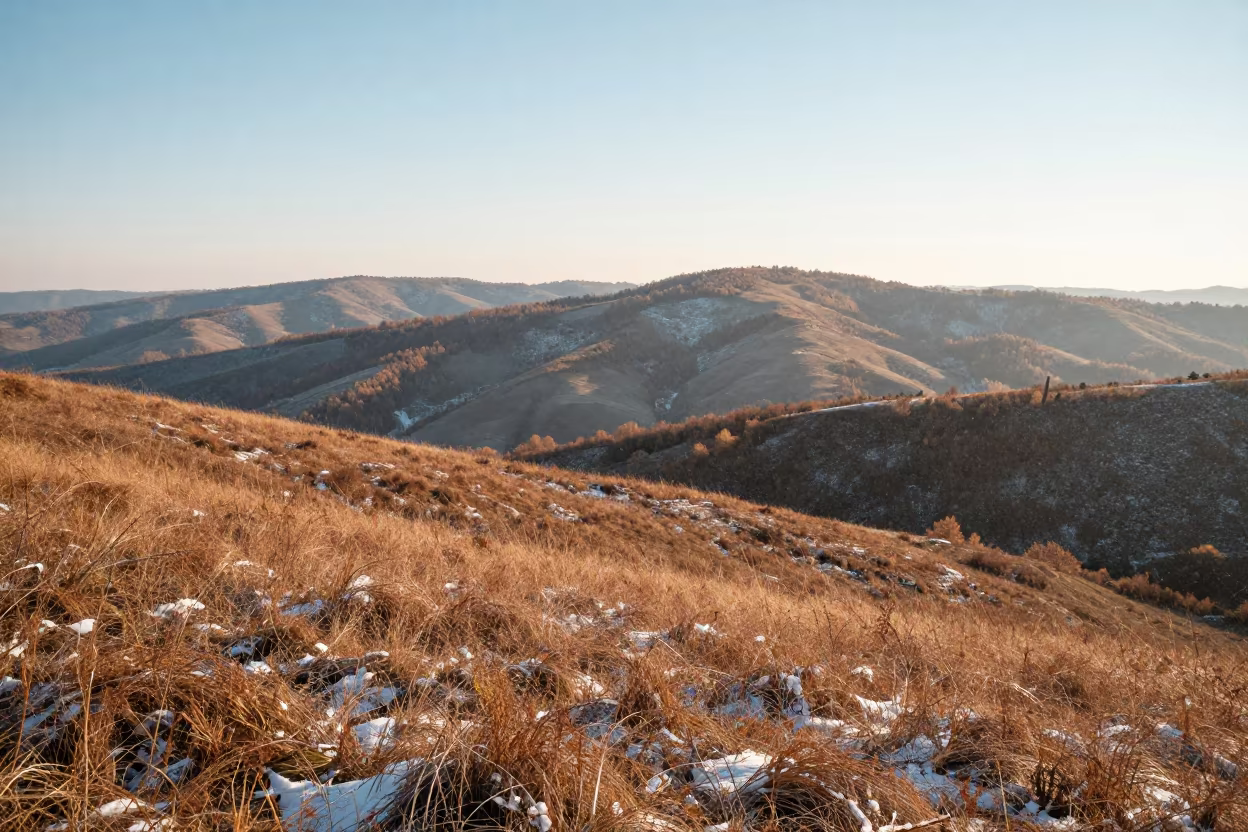 Snow on Moldovan Steppe Late Afternoon Ridge in from a ridge above layered foothills in Moldova