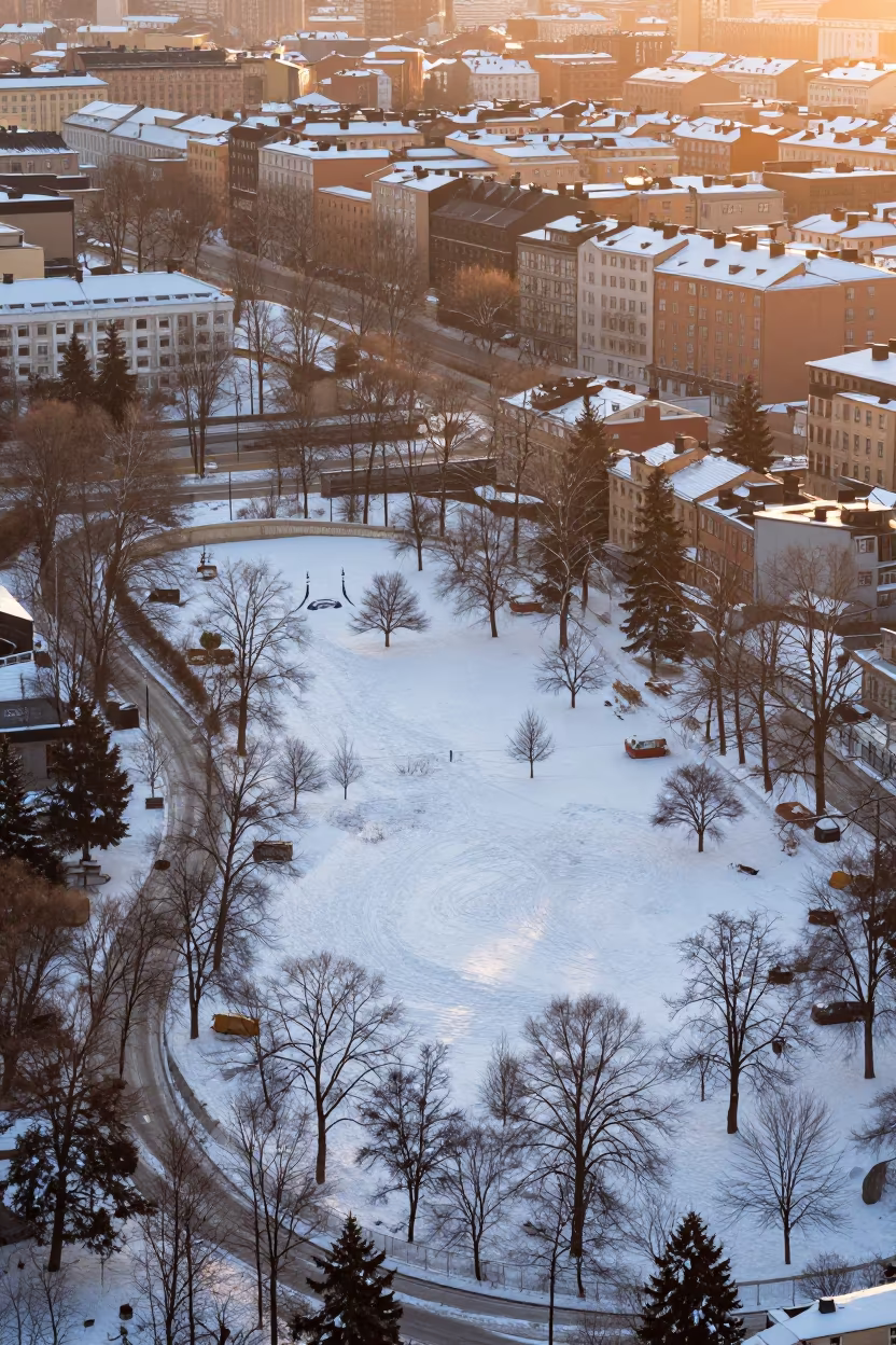 Snow Park Stockholm Copper Light Winter Aerial in far above terraced hillsides near Stockholm