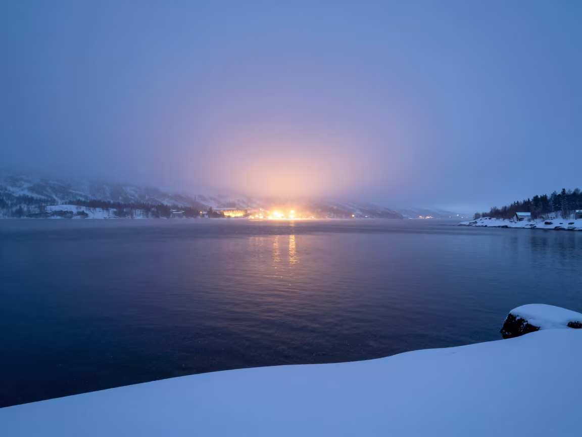 Snow Squall Over Lake Murmansk Twilight in through low marine fog near Murmansk
