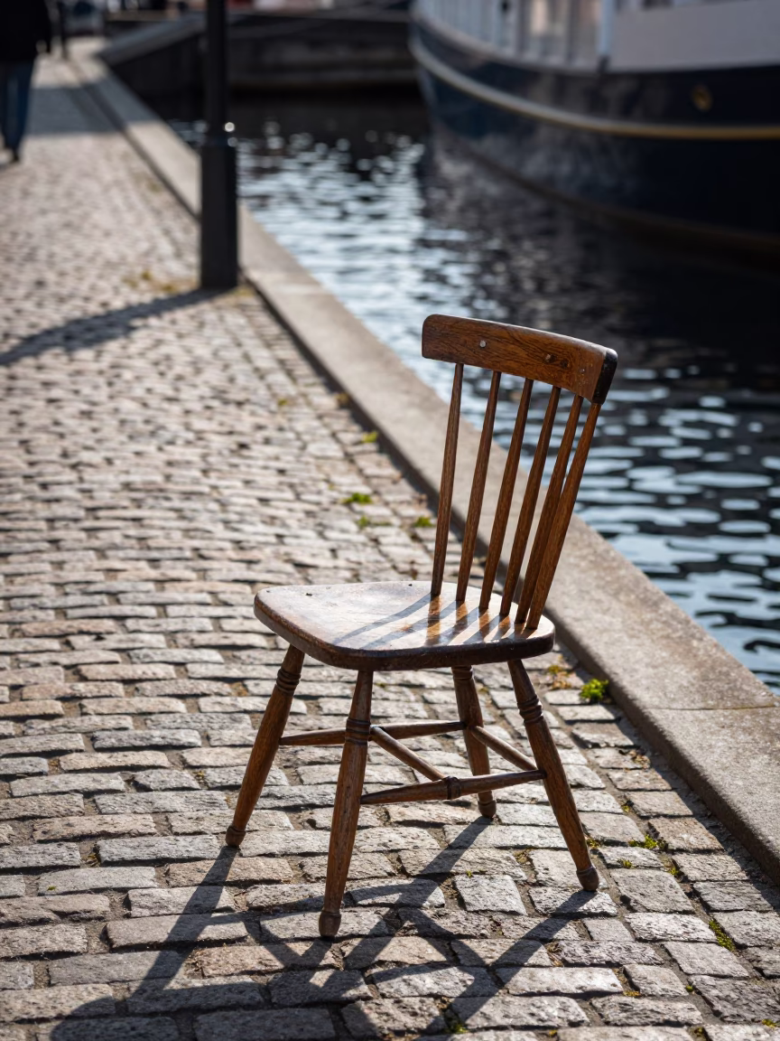 Spindle Chair and Cobblestone Street in Late Morning Copenhagen Denmark in in Copenhagen, Denmark
