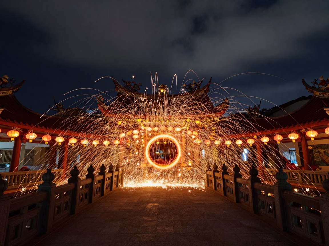 Spinning Steel Wool Sparks Under Malaysian Temple Bridge in in a lantern-lined temple precinct in Malaysia