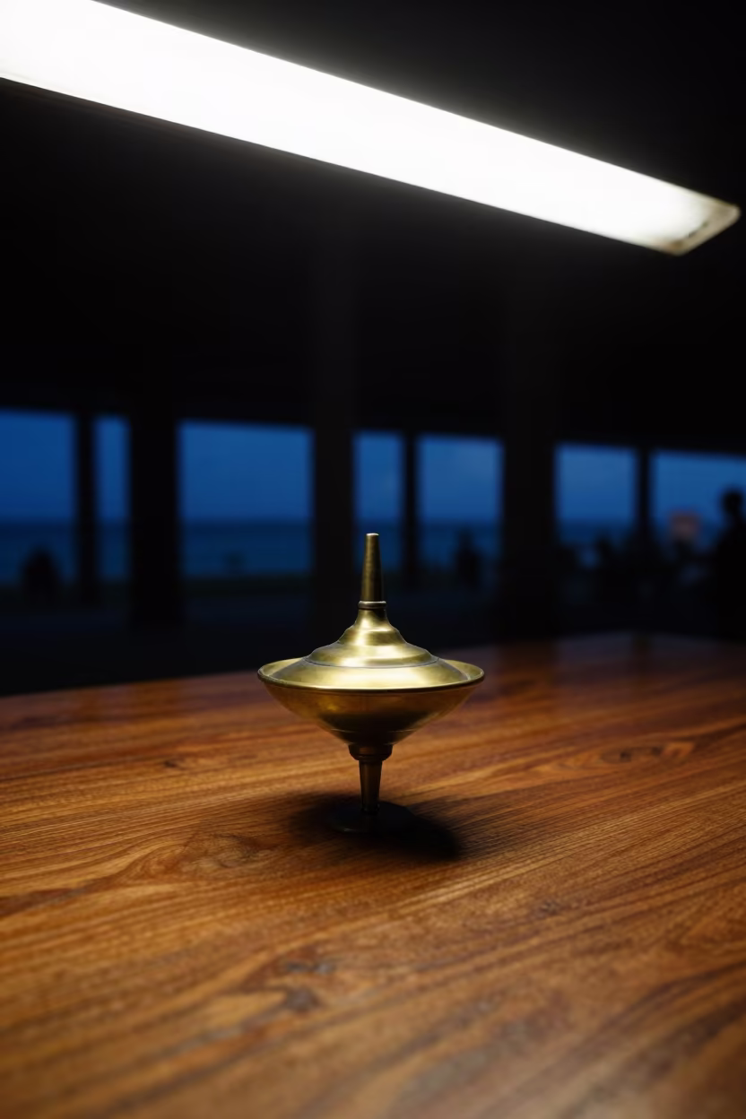 Spinning Top on Pier Table Night in on a pier railing in Cancun