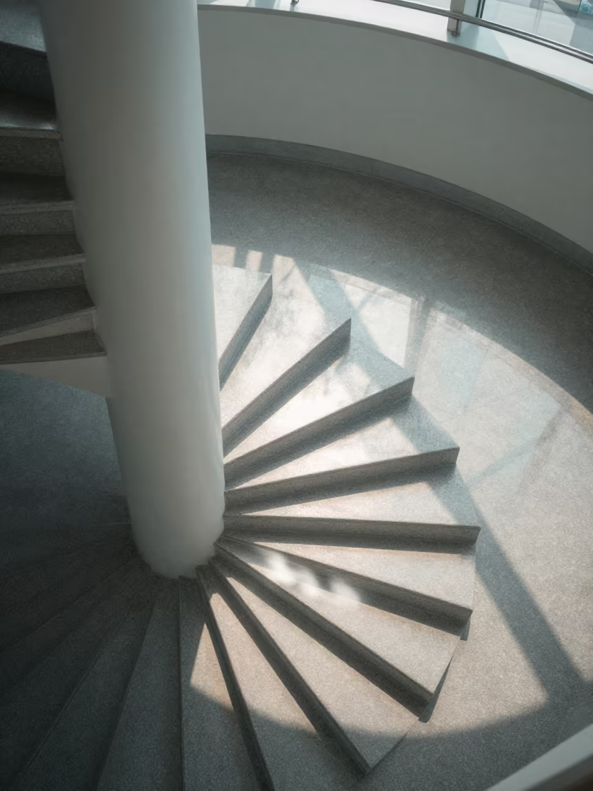 Spiral Staircase Shadow Pattern Skylit Yokohama in inside a skylit passageway in Yokohama