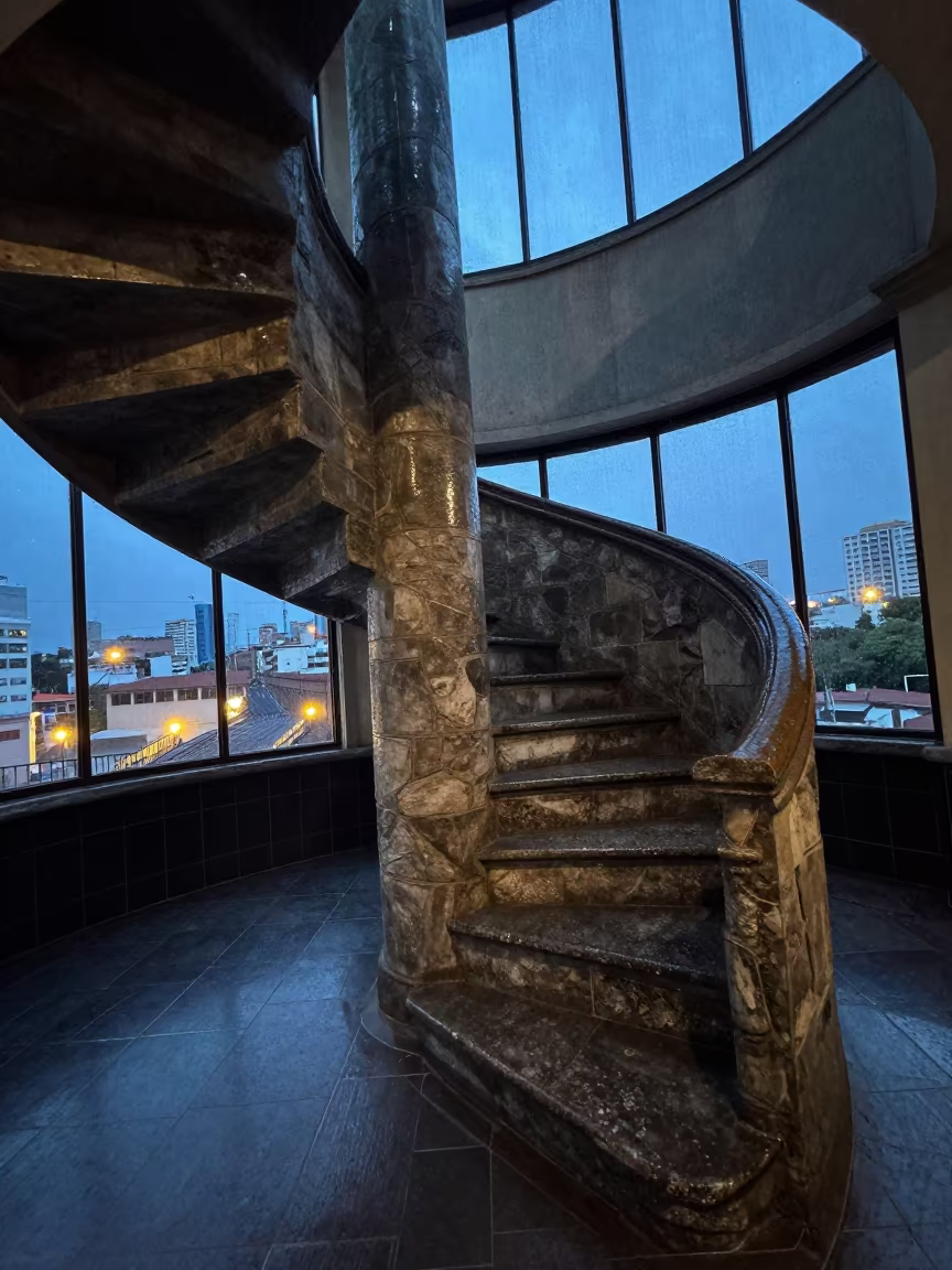 Spiral Stone Staircase in San Salvador Twilight Hall in inside a tiled stair hall near San Salvador