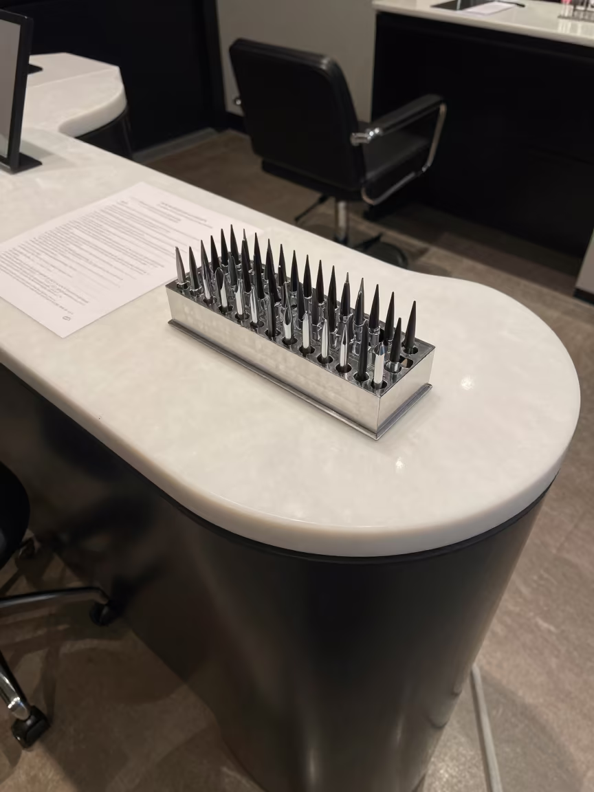Spokane Salon Drill Bit Caddy Late Night in at a salon reception counter in Spokane