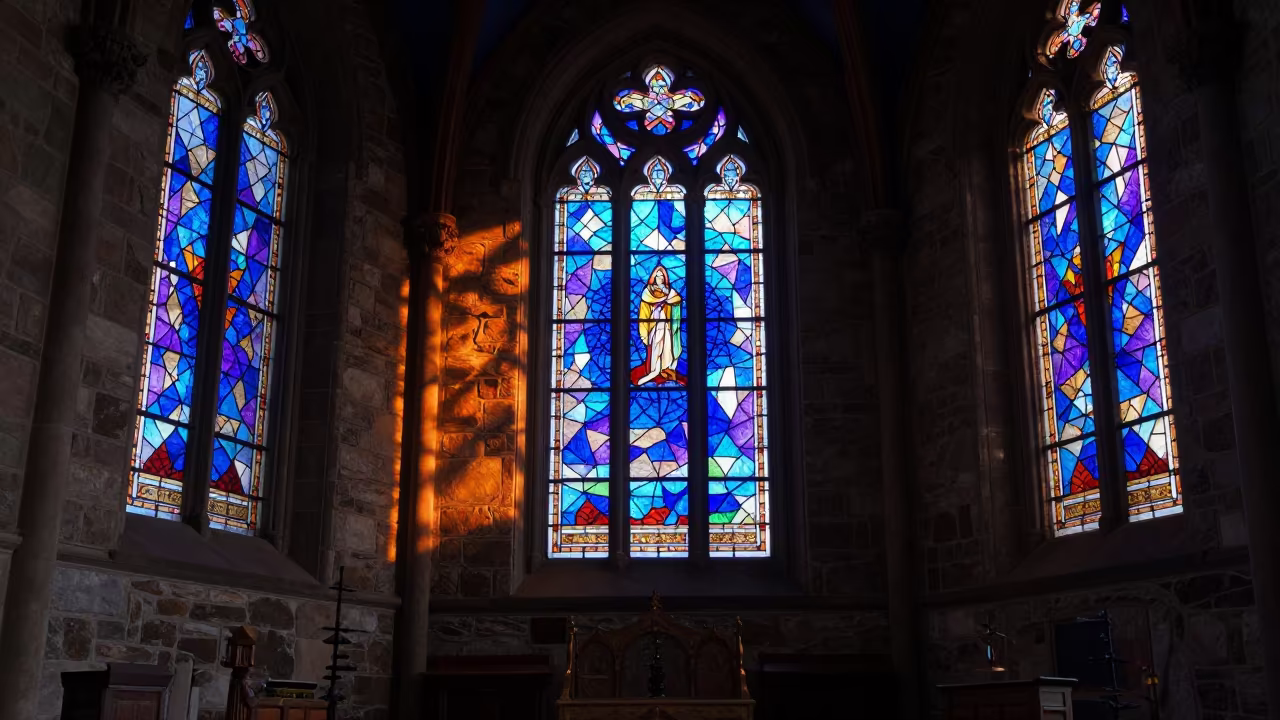 Stained Glass Patterns on Chapel Stone in in a chapel lit by stained glass in Calgary