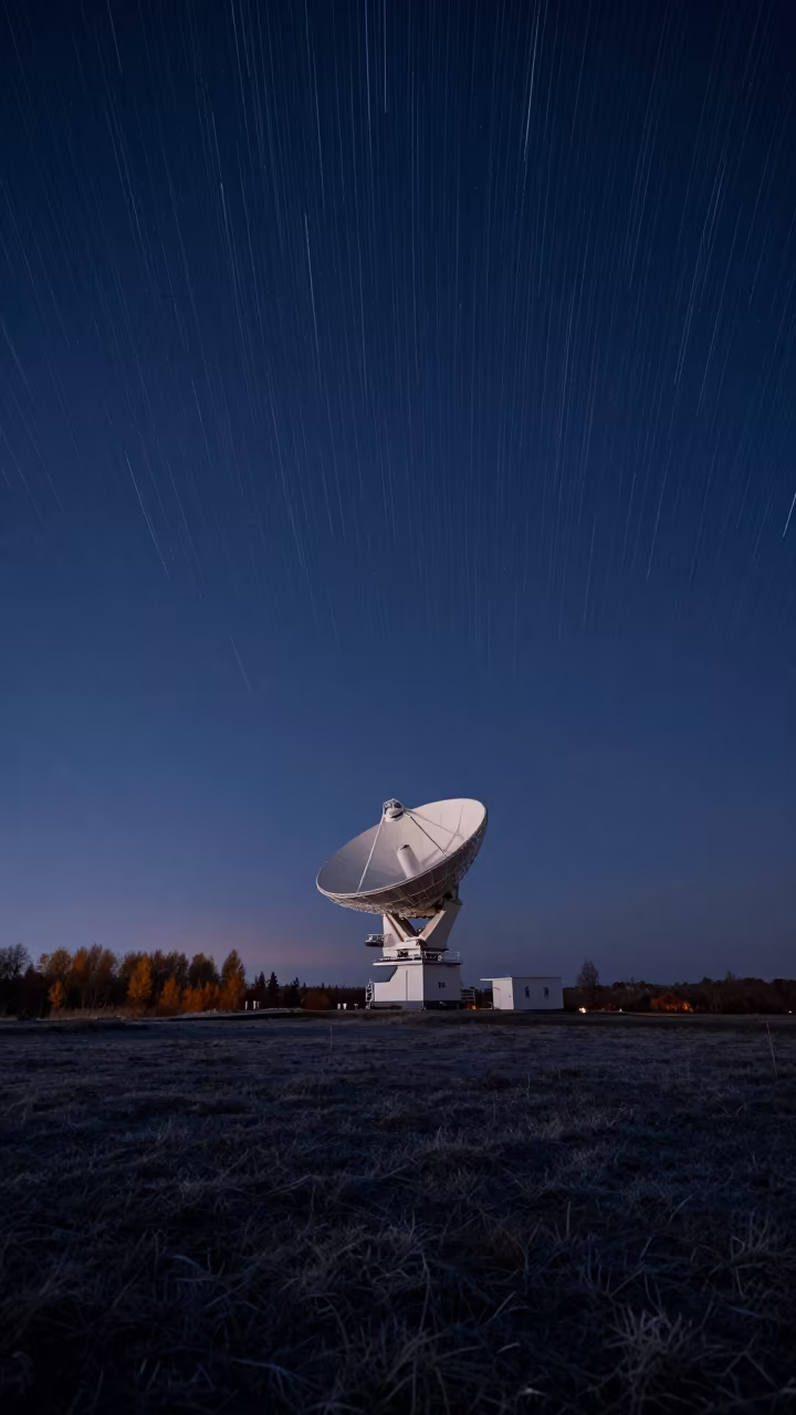 Star Trails Arc Over Radio Dish Almere Ridge in from a frost-hushed ridgeline near Almere